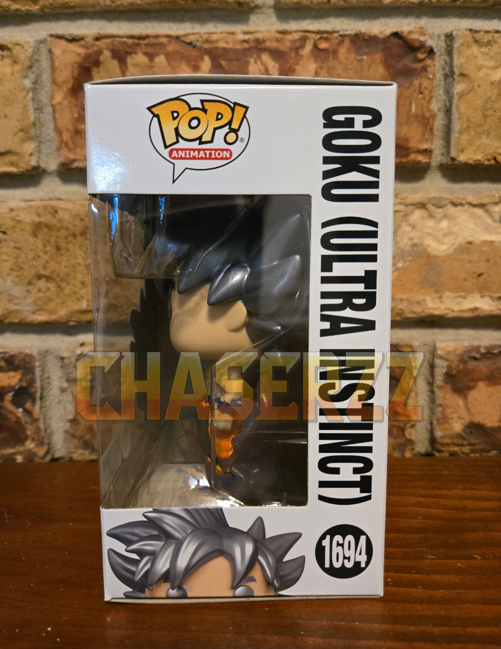 Funko Pop! Dragon Ball Super Goku (Ultra Instinct) 1694 GITD Hot Topic Exclusive